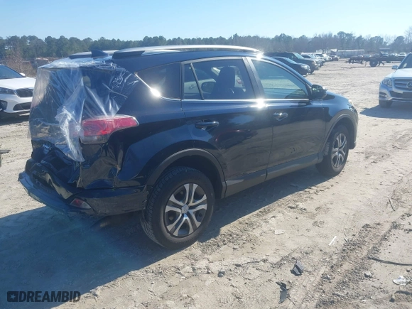 2017 Toyota RAV4 LE with VIN JTMZFREV9HJ719316, listed as a IAAI auction lot 41497253 with 98,357 mi miles. Bid and sale history available at carsss.com. Image 4.