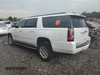 2020 GMC Yukon XL SLT with VIN 1GKS1GKC7LR292465, listed as a Copart auction lot 61487784 with 106,103 mi miles and Salvage Title. Bid and sale history available at carsss.com. Image 2.