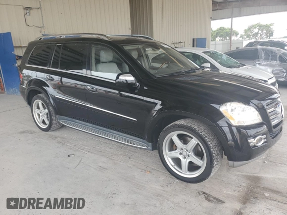2009 Mercedes-Benz GL-Class 5.5L with VIN 4JGBF86E49A523923, listed as a Copart auction lot 76511554 with 184,489 mi miles and Salvage Title. Bid and sale history available at carsss.com. Image 4.
