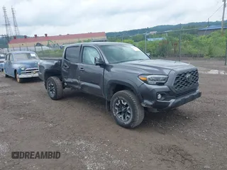 2021 Toyota Tacoma SR with VIN 3TYCZ5AN9MT052891, listed as a IAAI auction lot 42635634 with 94,717 mi miles and . Bid and sale history available at DreamBid. Image 1.