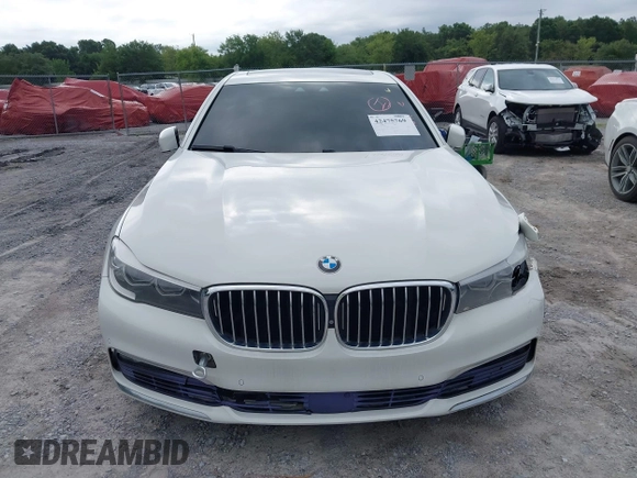 2017 BMW 7 Series 740i z VIN WBA7E2C53HG740273, wystawiony jako IAAI lot #42475769 z przebiegiem Nie podano mil oraz . Historia ofert i sprzedaży dostępna na DreamBid. Obrazek 12.