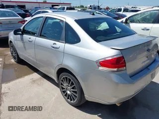 2009 Ford Focus SES with VIN 1FAHP36N69W102910, listed as a IAAI auction lot 42098402 with 149,957 mi miles. Bid and sale history available at carsss.com. Image 3.