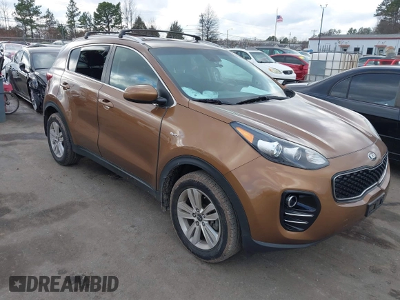 2018 Kia Sportage LX with VIN KNDPMCAC5J7419709, listed as a IAAI auction lot 41230791 with 85,491 mi miles. Bid and sale history available at carsss.com. Image 1.