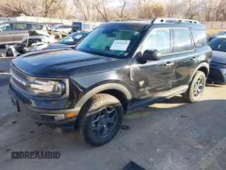 2021 Ford Bronco Sport Badlands z VIN 3FMCR9D92MRB30167, wystawiony jako IAAI lot #41313354 z przebiegiem 53 367 mil mil oraz . Historia ofert i sprzedaży dostępna na DreamBid. Obrazek 17.