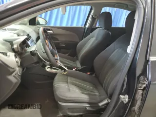 2015 Chevrolet Sonic LT with VIN 1G1JC5SH9F4164028, listed as a Copart auction lot 58870255 with 140,579 mi miles and Clean title. Bid and sale history available at DreamBid. Image 7.