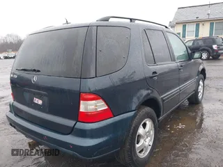 2003 Mercedes-Benz M-Class 3.2L with VIN 4JGAB54EX3A390987, listed as a IAAI auction lot 41482335 with 191,381 mi miles. Bid and sale history available at carsss.com. Image 4.