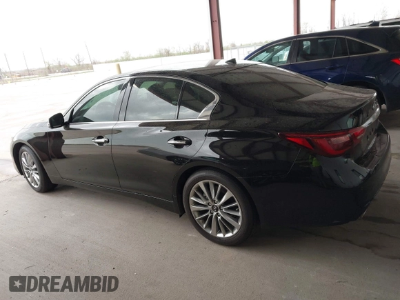 2023 Infiniti Q50 Luxe with VIN JN1EV7BPXPM512588, listed as a IAAI auction lot 41819661 with 30,817 mi miles and . Bid and sale history available at DreamBid. Image 14.