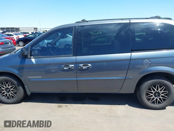 2001 Dodge Caravan Sport with VIN 2B4GP44351R298698, listed as a IAAI auction lot 42035781 with 203,496 mi miles and . Bid and sale history available at DreamBid. Image 14.