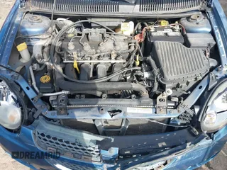 2003 Dodge Neon SXT with VIN 1B3ES56C53D140431, listed as a IAAI auction lot 41418378 with 92,034 mi miles. Bid and sale history available at carsss.com. Image 10.