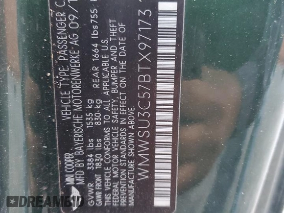2011 MINI Hardtop with VIN WMWSU3C57BTX97173, listed as a Copart auction lot 50369155 with 122,713 mi miles and Salvage Title. Bid and sale history available at DreamBid. Image 12.
