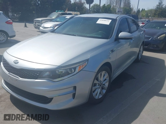 2018 Kia Optima LX with VIN 5XXGT4L31JG267716, listed as a IAAI auction lot 41890611 with 63,491 mi miles and . Bid and sale history available at carsss.com. Image 6.