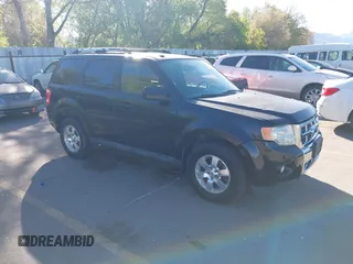2011 Ford Escape Limited with VIN 1FMCU9EGXBKB66282, listed as a IAAI auction lot 42177063 with 244,515 mi miles. Bid and sale history available at carsss.com. Image 1.