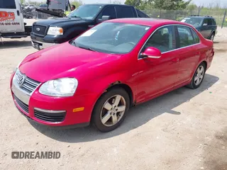2008 Volkswagen Jetta SE z VIN 3VWRM71KX8M054187, wystawiony jako IAAI lot #42279897 z przebiegiem 179 228 mil mil oraz . Historia ofert i sprzedaży dostępna na DreamBid. Obrazek 2.