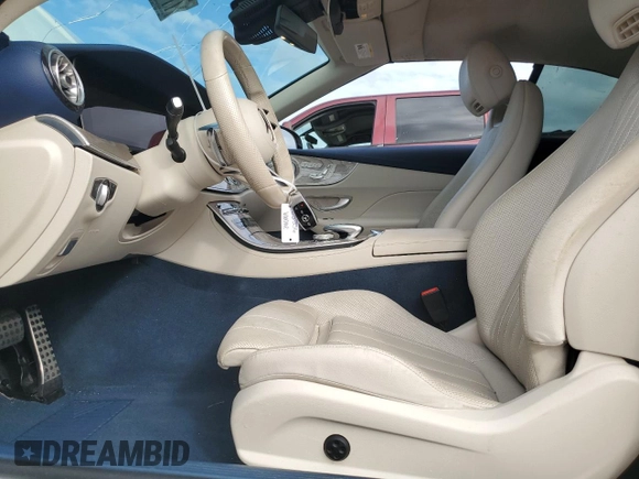 2021 Mercedes-Benz E 450 with VIN W1K1K5JB8MF157053, listed as a Copart auction lot 77119904 with 14,081 mi miles and Salvage title. Bid and sale history available at DreamBid. Image 7.