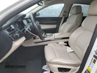 2012 BMW 7 Series 750Li xDrive z VIN WBAKC8C54CC434833, wystawiony jako Copart lot #69899284 z przebiegiem 110 959 mil mil oraz Szkoda całkowita • Salvage title. Historia ofert i sprzedaży dostępna na DreamBid. Obrazek 7.