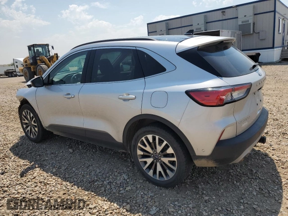 2020 Ford Escape Titanium with VIN 1FMCU9J98LUA78182, listed as a Copart auction lot 60477635 with 76,117 mi miles and Salvage title. Bid and sale history available at DreamBid. Image 2.