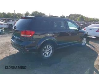 2013 Dodge Journey SXT with VIN 3C4PDCBG7DT710844, listed as a IAAI auction lot 40582910 with 136,741 mi miles and . Bid and sale history available at DreamBid. Image 4.