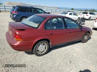1996 Saturn SL with VIN 1G8ZK5278TZ334649, listed as a Copart auction lot 54098725 with 156,012 mi miles and Salvage Title. Bid and sale history available at carsss.com. Image 3.