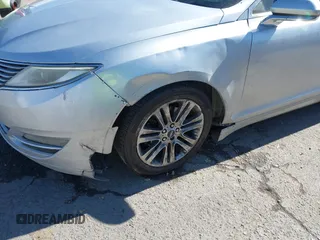 2014 Lincoln MKZ with VIN 3LN6L2GK2ER817686, listed as a IAAI auction lot 41505907 with 318,636 mi miles. Bid and sale history available at carsss.com. Image 6.