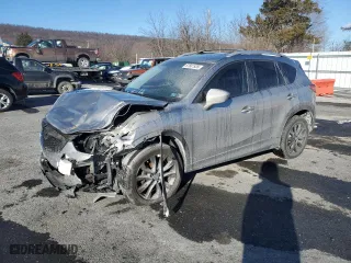 2013 Mazda CX-5 Grand Touring with VIN JM3KE4DE3D0138832, listed as a Copart auction lot 87681935 with 133,836 mi miles and Salvage Title. Bid and sale history available at carsss.com. Image 1.