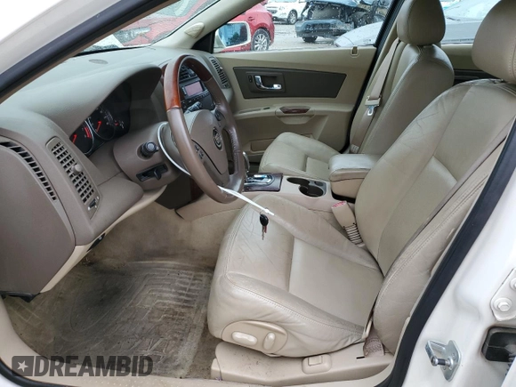 2007 Cadillac CTS with VIN 1G6DM57T070106111, listed as a Copart auction lot 52565605 with 128,609 mi miles and Non repairable. Bid and sale history available at DreamBid. Image 7.