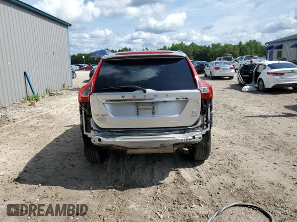 2014 Volvo XC60 R-Design Premier Plus with VIN YV4902DZ5E2516262, listed as a Copart auction lot 57967335 with 123,313 mi miles and Salvage title. Bid and sale history available at DreamBid. Image 6.