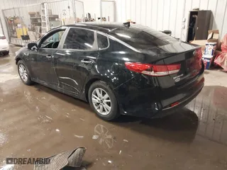 2017 Kia Optima LX with VIN 5XXGT4L31HG165150, listed as a IAAI auction lot 40985407 with 154,945 mi miles. Bid and sale history available at carsss.com. Image 3.