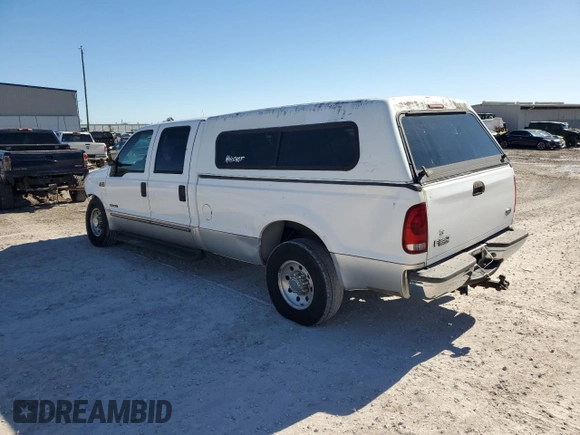 1999 Ford F-350 XL with VIN 1FTSW30F3XEE22631, listed as a Copart auction lot 83521754 with 368,980 mi miles and Salvage title. Bid and sale history available at DreamBid. Image 2.