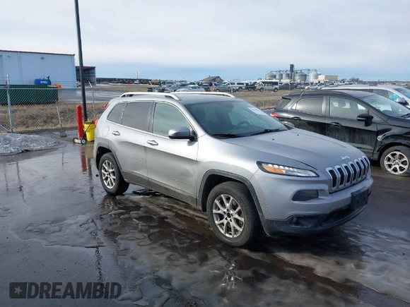 2014 Jeep Cherokee Latitude with VIN 1C4PJMCS9EW122196, listed as a IAAI auction lot 41649757 with 205,363 mi miles and . Bid and sale history available at DreamBid. Image 1.