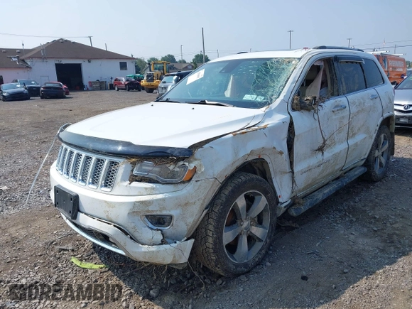 2015 Jeep Grand Cherokee Overland with VIN 1C4RJFCGXFC880096, listed as a IAAI auction lot 42706085 with 74,044 mi miles and . Bid and sale history available at DreamBid. Image 19.