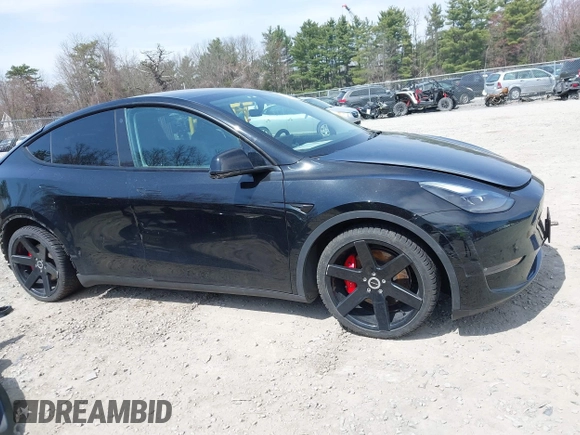 2022 Tesla Model Y Performance with VIN 7SAYGDEF7NF310113, listed as a IAAI auction lot 42038407 with 46,052 mi miles and . Bid and sale history available at DreamBid. Image 14.
