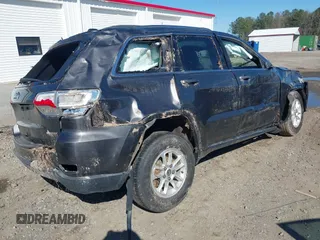 2018 Jeep Grand Cherokee Laredo E with VIN 1C4RJFAG8JC335459, listed as a IAAI auction lot 41850163 with 93,289 mi miles. Bid and sale history available at carsss.com. Image 4.