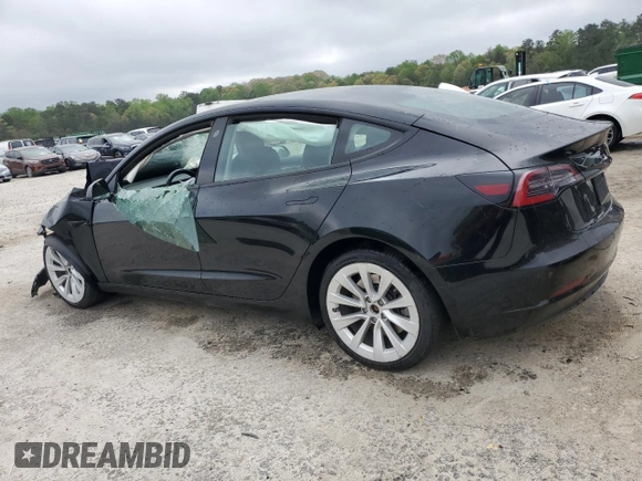 2022 Tesla Model 3 with VIN 5YJ3E1EA1NF369979, listed as a Copart auction lot 51351785 with 0 mi miles and Salvage Title. Bid and sale history available at carsss.com. Image 2.