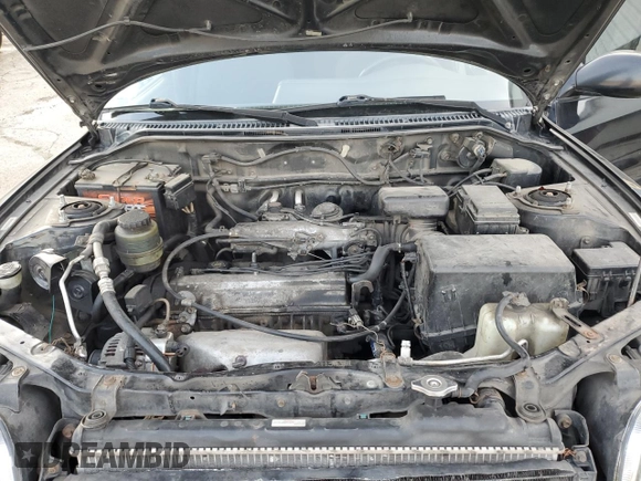 1999 Toyota RAV4 with VIN JT3GP10V9X7042801, listed as a Copart auction lot 82712874 with 256,151 mi miles and Salvage Title. Bid and sale history available at DreamBid. Image 11.