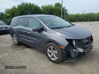 2019 Honda Odyssey EX with VIN 5FNRL6H50KB028595, listed as a Copart auction lot 65846434 with 77,596 mi miles and Salvage title. Bid and sale history available at DreamBid. Image 4.