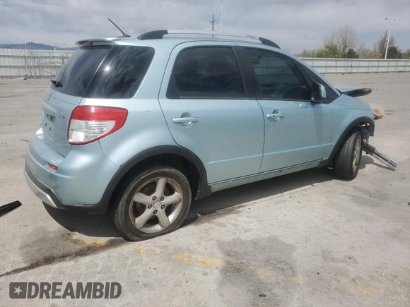 2009 Suzuki SX4 Touring AWD z VIN JS2YB417396203092, wystawiony jako Copart lot #53965685 z przebiegiem 153 701 mil mil oraz Szkoda całkowita • Salvage title. Historia ofert i sprzedaży dostępna na DreamBid. Obrazek 3.