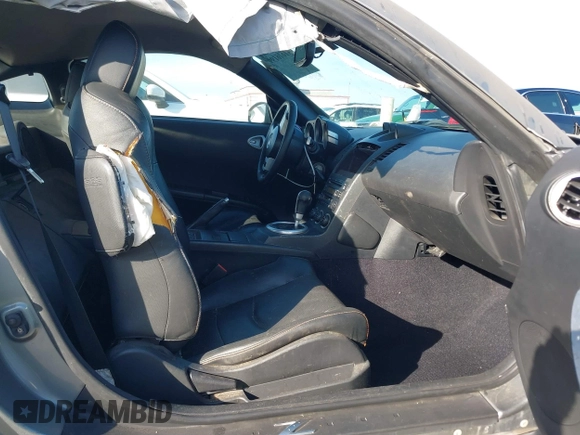 2004 Nissan 350Z Touring with VIN JN1AZ34E84T060682, listed as a IAAI auction lot 41616199 with 209,814 mi miles. Bid and sale history available at carsss.com. Image 5.