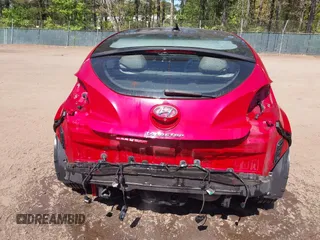 2012 Hyundai Veloster w/Gray Int z VIN KMHTC6AD0CU048339, wystawiony jako IAAI lot #42040008 z przebiegiem 117 895 mil mil oraz . Historia ofert i sprzedaży dostępna na DreamBid. Obrazek 6.