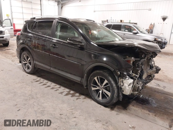 2018 Toyota RAV4 XLE with VIN 2T3RFREV3JW817989, listed as a IAAI auction lot 41636957 with 182,265 mi miles. Bid and sale history available at carsss.com. Image 1.