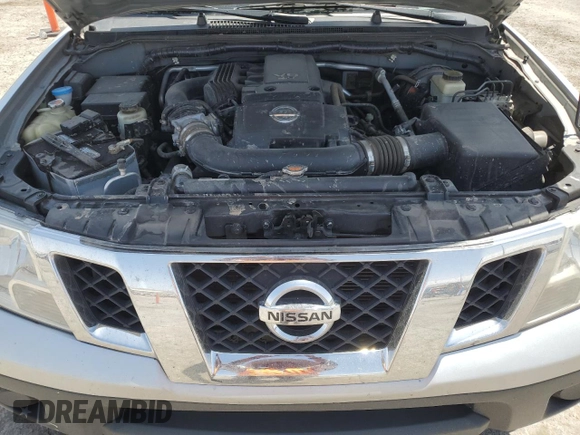 2015 Nissan Frontier SV z VIN 1N6AD0ER4FN724041, wystawiony jako Copart lot #61974815 z przebiegiem 73 353 mil mil oraz Szkoda całkowita • Salvage title. Historia ofert i sprzedaży dostępna na DreamBid. Obrazek 11.