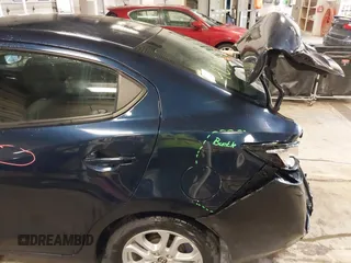 2016 Scion iA z VIN 3MYDLBZV5GY146138, wystawiony jako IAAI lot #42303472 z przebiegiem 29 289 mil mil oraz . Historia ofert i sprzedaży dostępna na DreamBid. Obrazek 20.