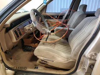 1993 Buick Regal Custom with VIN 2G4WB54L4P1411904, listed as a Copart auction lot 56564455 with 112,248 mi miles and Salvage title. Bid and sale history available at DreamBid. Image 7.