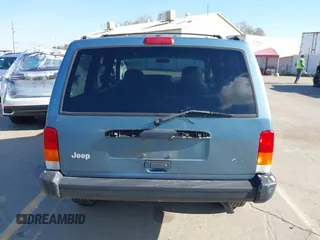 1998 Jeep Cherokee Sport with VIN 1J4FT68S0WL231959, listed as a IAAI auction lot 41680076 with 252,369 mi miles. Bid and sale history available at carsss.com. Image 16.