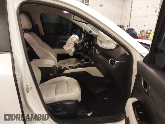 2018 Mazda CX-5 S Premium with VIN JM3KFBDM1J1412088, listed as a IAAI auction lot 41497431 with 65,532 mi miles and . Bid and sale history available at DreamBid. Image 5.
