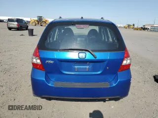 2007 Honda Fit with VIN JHMGD37407S044719, listed as a Copart auction lot 59192715 with 275,955 mi miles and Clean title. Bid and sale history available at DreamBid. Image 6.