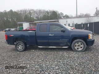 2007 Chevrolet Silverado 1500 LT w/1LT with VIN 2GCEC19C971650265, listed as a IAAI auction lot 41572601 with 240,251 mi miles. Bid and sale history available at carsss.com. Image 14.