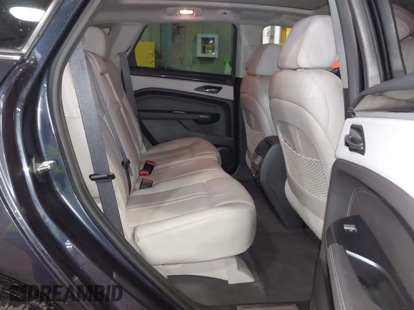 2016 Cadillac SRX Luxury Collection z VIN 3GYFNEE38GS565721, wystawiony jako IAAI lot #41963005 z przebiegiem 87 005 mil mil oraz . Historia ofert i sprzedaży dostępna na DreamBid. Obrazek 8.
