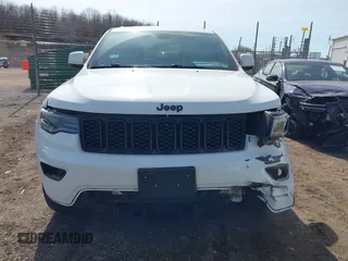 2017 Jeep Grand Cherokee Altitude with VIN 1C4RJFAG8HC768449, listed as a IAAI auction lot 41777272 with 72,913 mi miles and . Bid and sale history available at DreamBid. Image 6.
