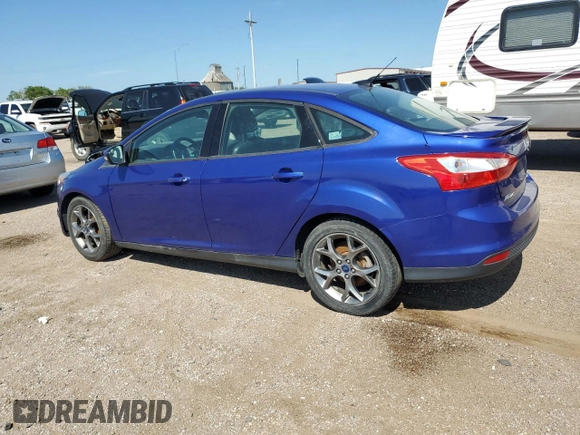 2013 Ford Focus SE with VIN 1FADP3F29DL352186, listed as a Copart auction lot 64972835 with 74,409 mi miles and Clean title. Bid and sale history available at DreamBid. Image 2.