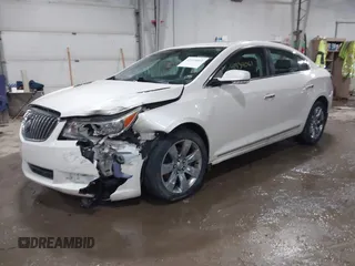 2013 Buick LaCrosse Leather z VIN 1G4GL5E31DF157332, wystawiony jako IAAI lot #41434061 z przebiegiem 153 426 mil mil oraz . Historia ofert i sprzedaży dostępna na DreamBid. Obrazek 17.